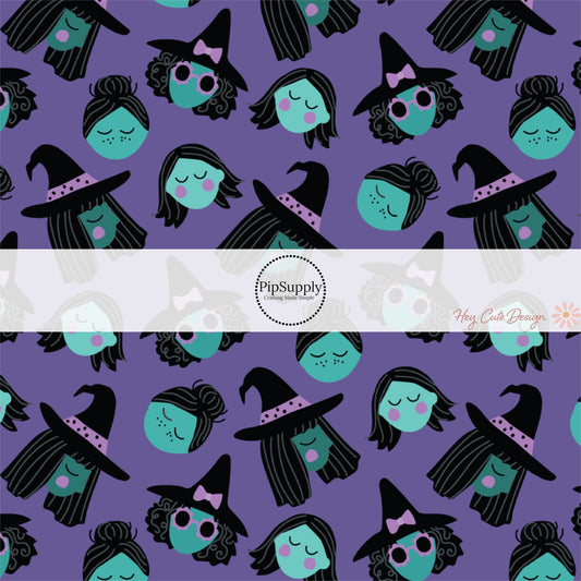 Blue witches on purple fabric by the yard.