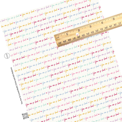 These Valentine's pattern themed faux leather sheets contain the following design elements: multi colored wording of "You Are So Loved" on cream. Our CPSIA compliant faux leather sheets or rolls can be used for all types of crafting projects.