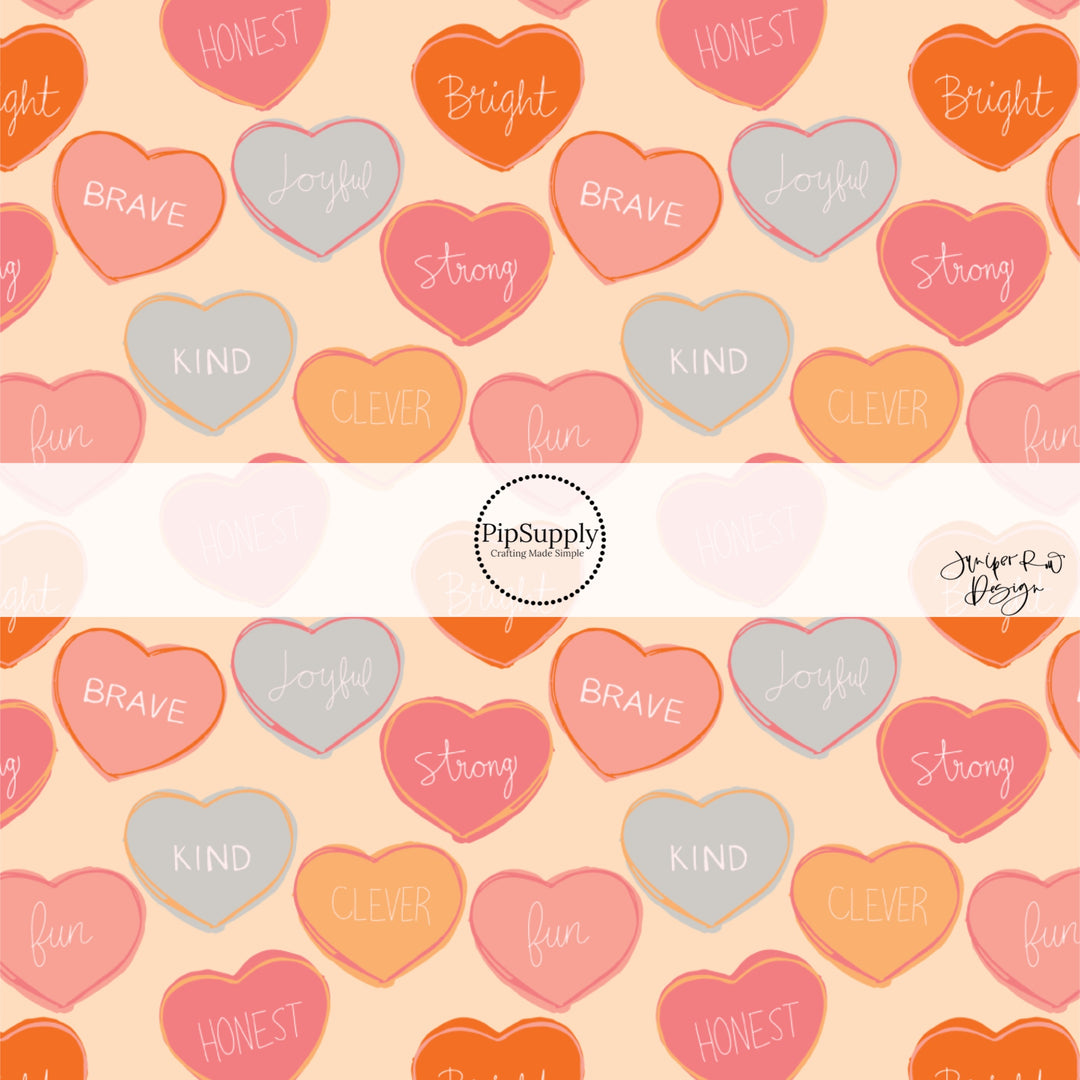 This holiday fabric by the yard features affirmation phrases on hearts. This festive pattern fabric can be used for all your sewing and crafting needs!