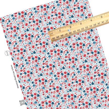 These 4th of July faux leather sheets contain the following design elements: patriotic red and blue flowers on cream. Our CPSIA compliant faux leather sheets or rolls can be used for all types of crafting projects.