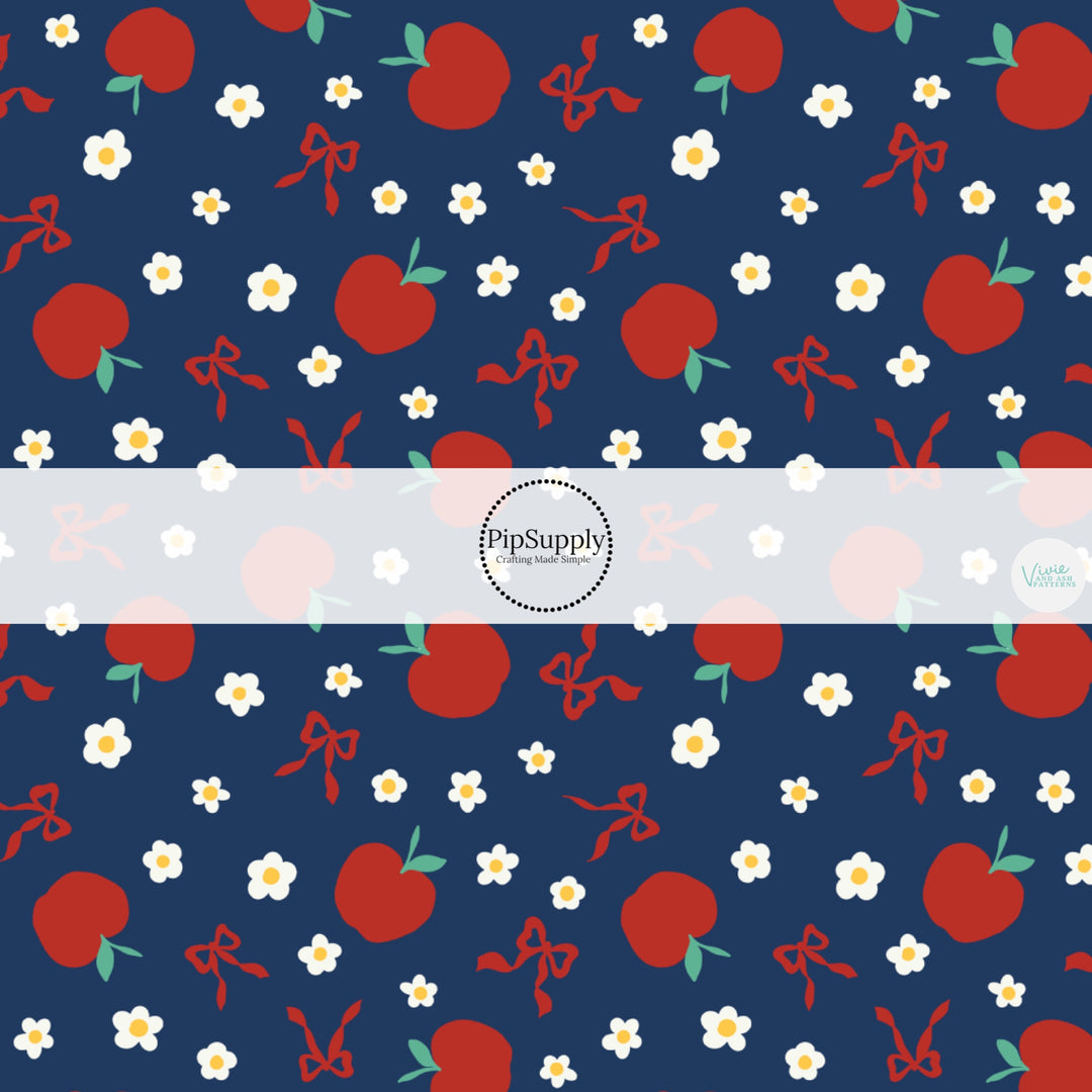 These school themed fabric by the yard features red apples, tiny daisies, and bows on blue. This fun themed fabric can be used for all your sewing and crafting needs!