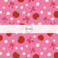 These school themed fabric by the yard features red apples, tiny daisies, and bows on pink. This fun themed fabric can be used for all your sewing and crafting needs!