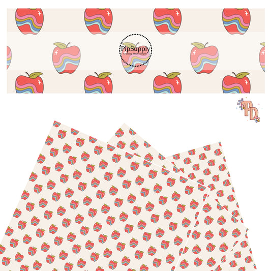 Colorful waves on red apples on cream faux leather sheets