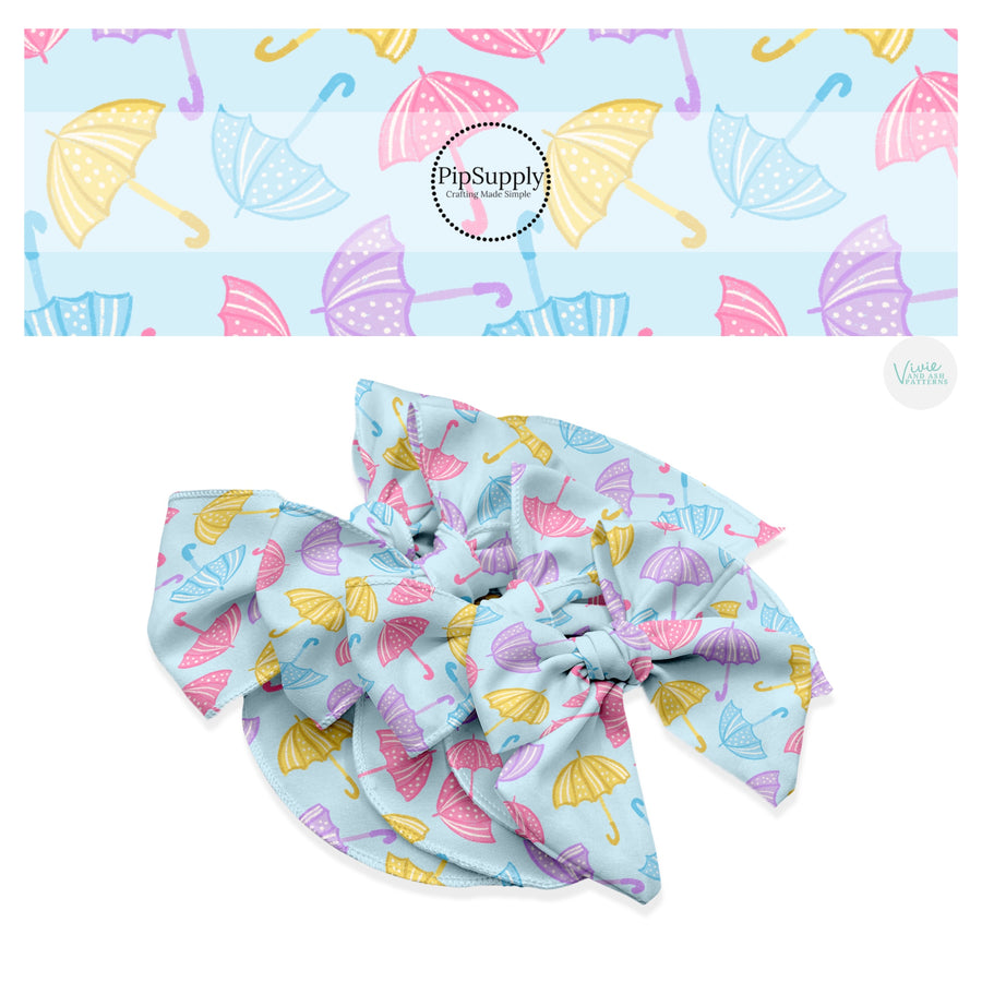 These spring themed no sew bow strips can be easily tied and attached to a clip for a finished hair bow. These patterned bow strips are great for personal use or to sell. These bow strips features pastel pink, purple, yellow, and blue rain umbrellas.