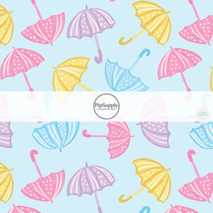 These spring themed no sew bow strips can be easily tied and attached to a clip for a finished hair bow. These patterned bow strips are great for personal use or to sell. These bow strips features pastel pink, purple, yellow, and blue rain umbrellas.