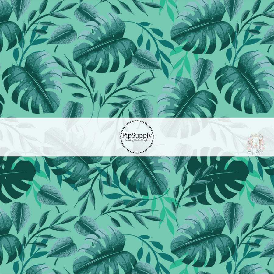 Dark green palms on aqua on fabric by the yard. 