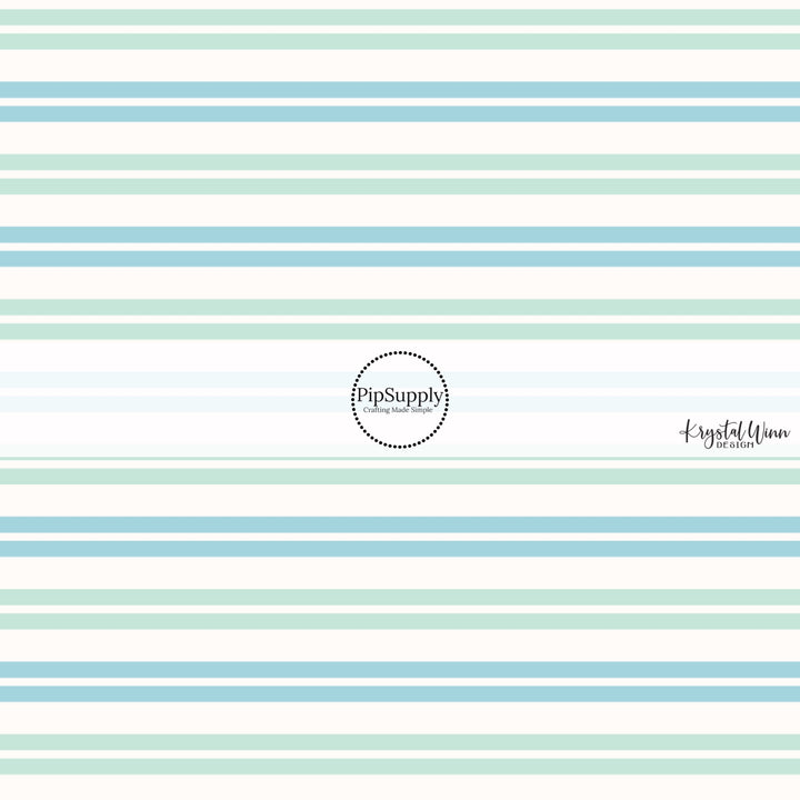 These striped themed fabric by the yard features mint and light blue stripes on cream. This fun party themed fabric can be used for all your sewing and crafting needs! 