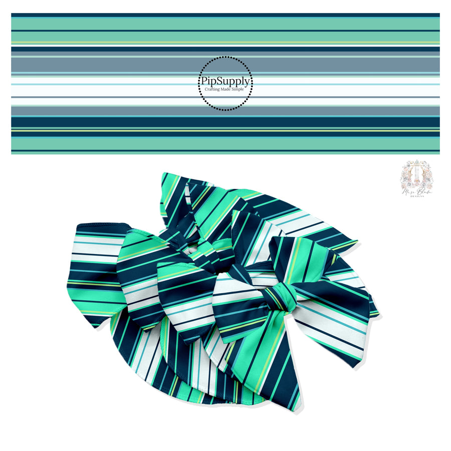 Tropical stripes in aqua, teal, light blue, light green, and dark navy hair bow strips.