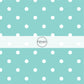 This celebration fabric by the yard features white dots on aqua. This fun themed fabric can be used for all your sewing and crafting needs!