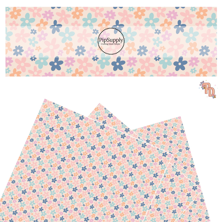 These spring floral pattern themed faux leather sheets contain the following design elements: pink, orange, and blue flowers on cream. Our CPSIA compliant faux leather sheets or rolls can be used for all types of crafting projects.