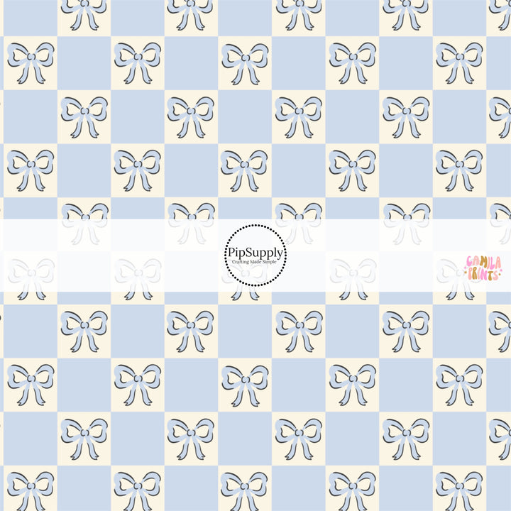 This spring themed fabric by the yard features blue bows on blue and cream checkers. This fun pattern fabric can be used for all your sewing and crafting needs!