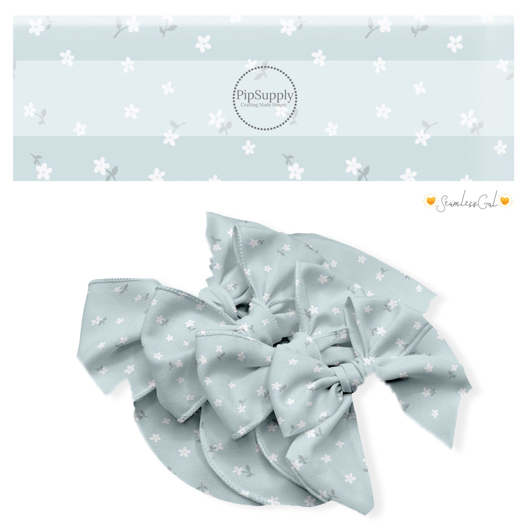 These spring no sew bow strips can be easily tied and attached to a clip for a finished hair bow. These fun bow strips are great for personal use or to sell. These bow strips feature the following design elements: tiny flowers on baby blue.