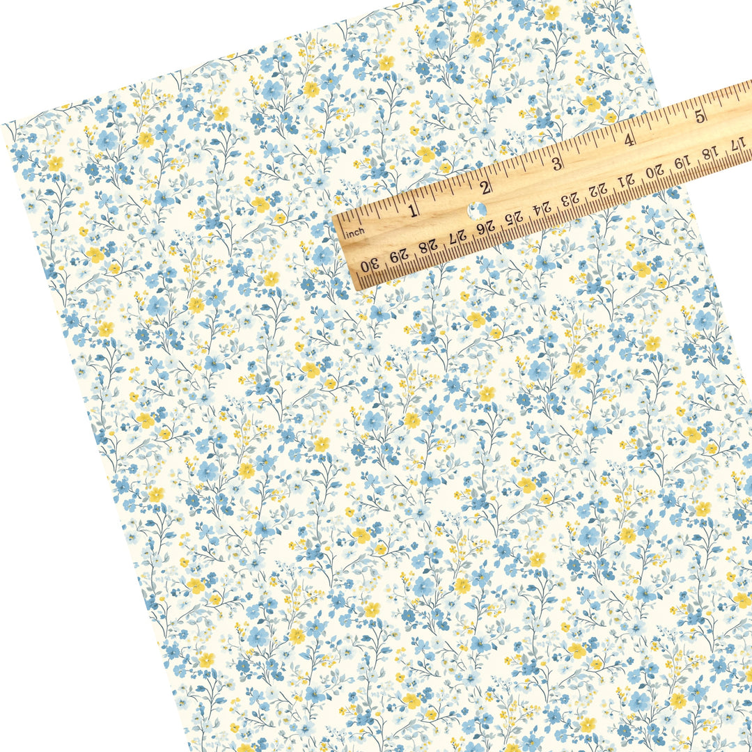 These floral themed faux leather sheets contain the following design elements: tiny blue and yellow flowers and leaves. Our CPSIA compliant faux leather sheets or rolls can be used for all types of crafting projects.