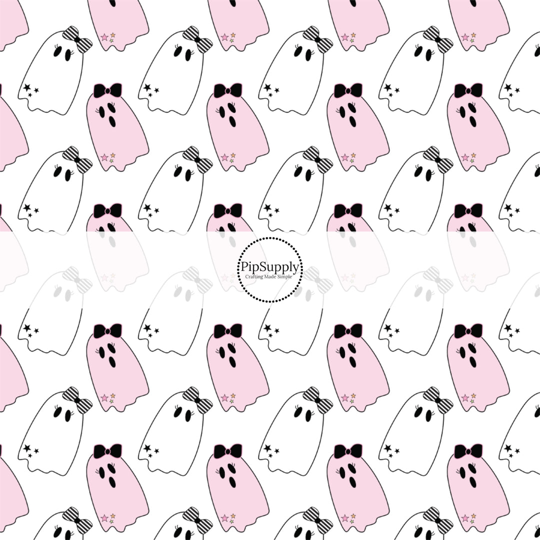 These Halloween themed pattern fabric by the yard features the following design elements: pink and white ghost. This fun spooky themed fabric can be used for all your sewing and crafting needs!