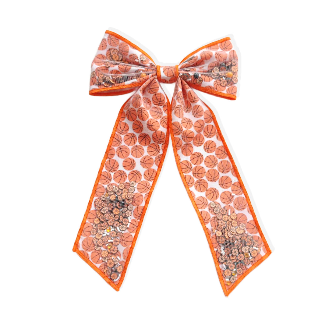 These sports pattern long tail shaker tied bows are ready to package and resell to your customers no sewing or measuring necessary! These hair bows come with a clip already attached. The shaker bow comes pre-filled with basketball pattern clay mix.