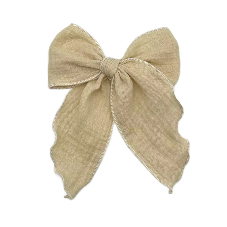 These solid pre-cut tied bows are ready to package and resell to your customers no sewing or measuring necessary! These hair bows come with a clip already attached.