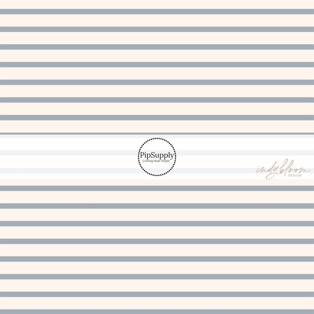 This summer fabric by the yard features cream and light blue stripes. This fun summer themed fabric can be used for all your sewing and crafting needs!