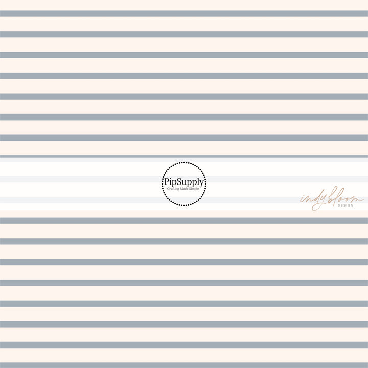 This summer fabric by the yard features cream and light blue stripes. This fun summer themed fabric can be used for all your sewing and crafting needs!