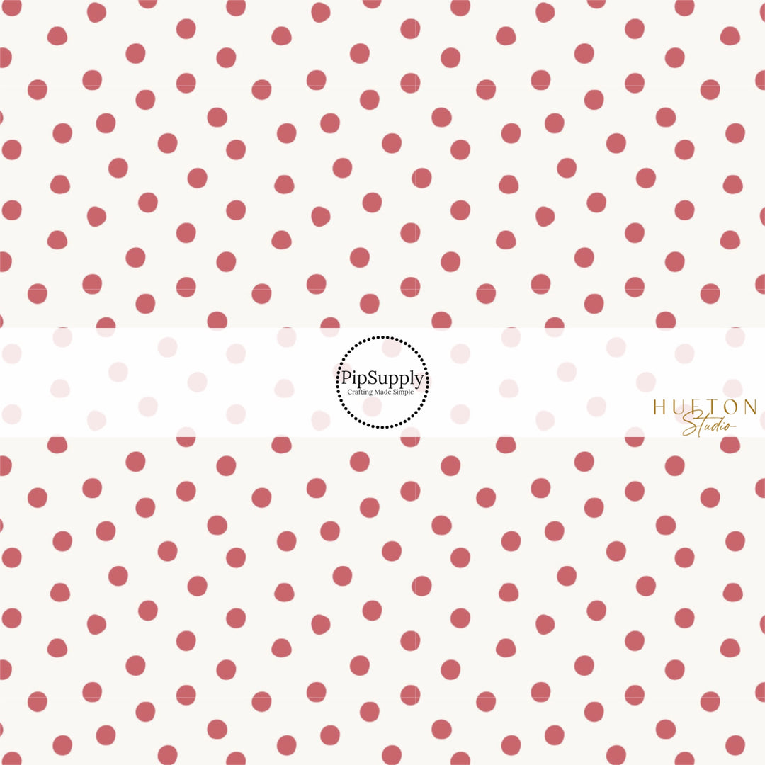 These spring fabric by the yard features berry polka dots. This fun pattern fabric can be used for all your sewing and crafting needs!