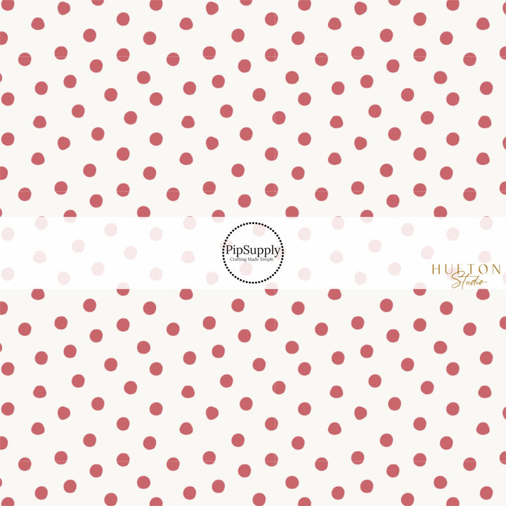 These spring fabric by the yard features berry polka dots. This fun pattern fabric can be used for all your sewing and crafting needs!