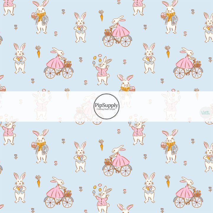 This Easter themed fabric by the yard features talented bunnies on bicycles on blue. This fun pattern fabric can be used for all your sewing and crafting needs!