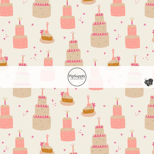 This celebration fabric by the yard features pink and cream birthday cakes and cake slices on cream. This fun birthday themed fabric can be used for all your sewing and crafting needs!