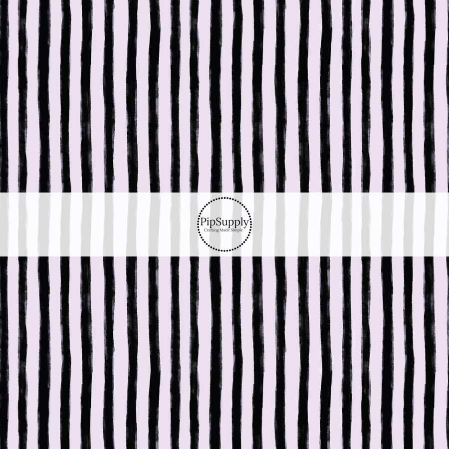 These stripe themed pattern fabric by the yard features the following design elements: black and lilac Halloween stripes. This fun themed fabric can be used for all your sewing and crafting needs!