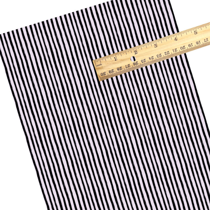 These stripe themed pattern faux leather sheets contain the following design elements: black and lilac Halloween stripes. Our CPSIA compliant faux leather sheets or rolls can be used for all types of crafting projects.