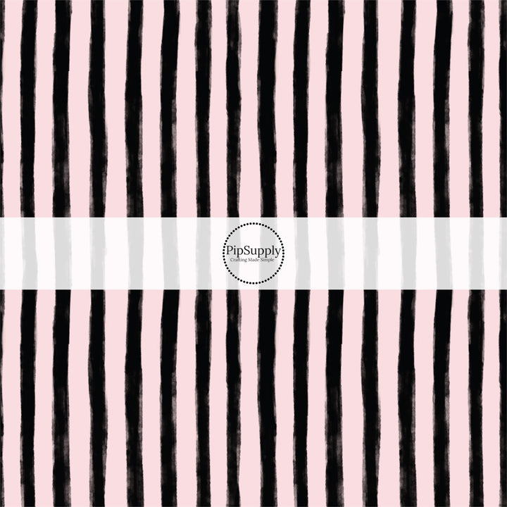 These stripe themed pattern fabric by the yard features the following design elements: black and pink Halloween stripes. This fun themed fabric can be used for all your sewing and crafting needs!