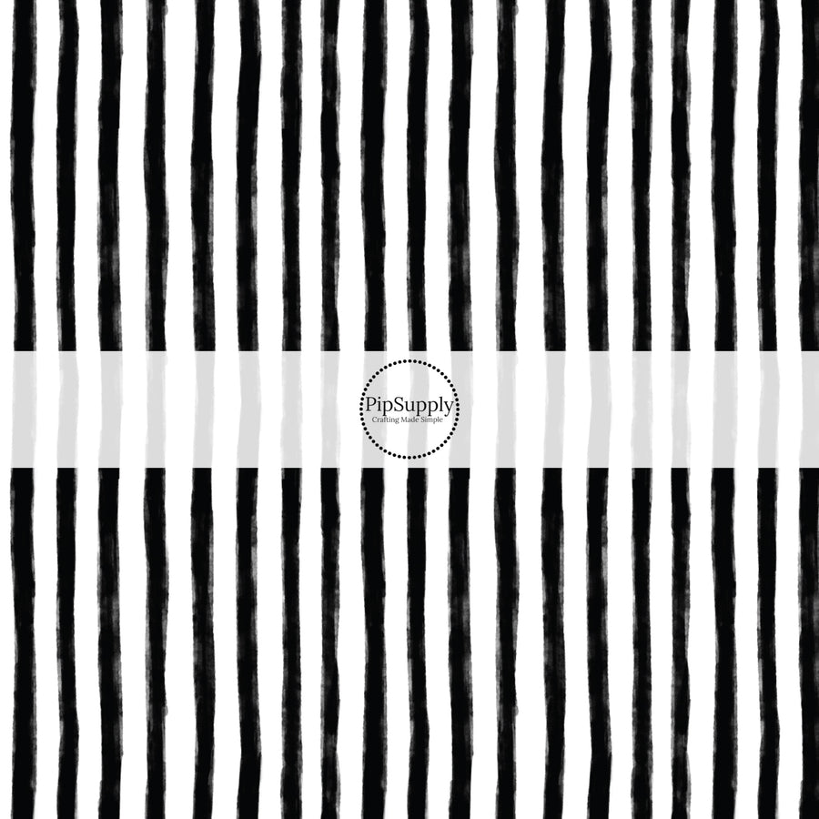 These stripe themed pattern fabric by the yard features the following design elements: black and white Halloween stripes. This fun themed fabric can be used for all your sewing and crafting needs!