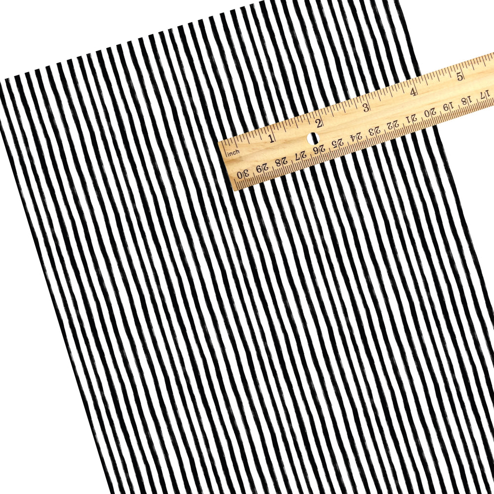 These stripe themed pattern faux leather sheets contain the following design elements: black and white Halloween stripes. Our CPSIA compliant faux leather sheets or rolls can be used for all types of crafting projects.