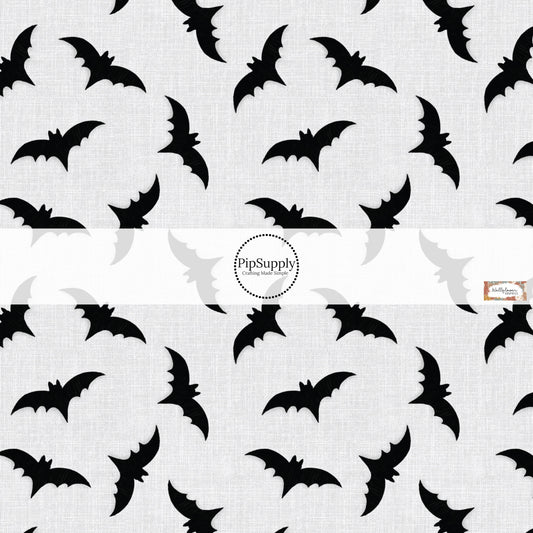 These Halloween themed pattern fabric by the yard features the following design elements: bats on gray. This fun spooky themed fabric can be used for all your sewing and crafting needs!