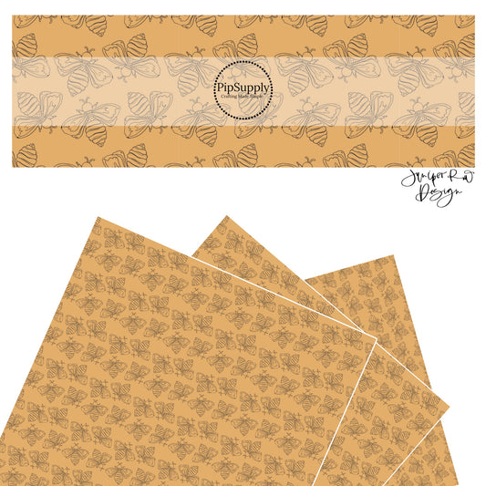 These bee themed light golden cream faux leather sheets contain the following design elements: outlined bee in black on dark tan. 
