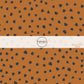 These speckled themed fabric by the yard features small black speckled dots on brown. This fun dotted themed fabric can be used for all your sewing and crafting needs! 