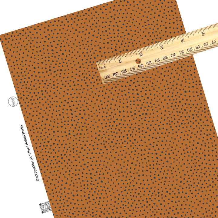 These speckled themed faux leather sheets contain the following design elements: small black speckled dots on brown. Our CPSIA compliant faux leather sheets or rolls can be used for all types of crafting projects.