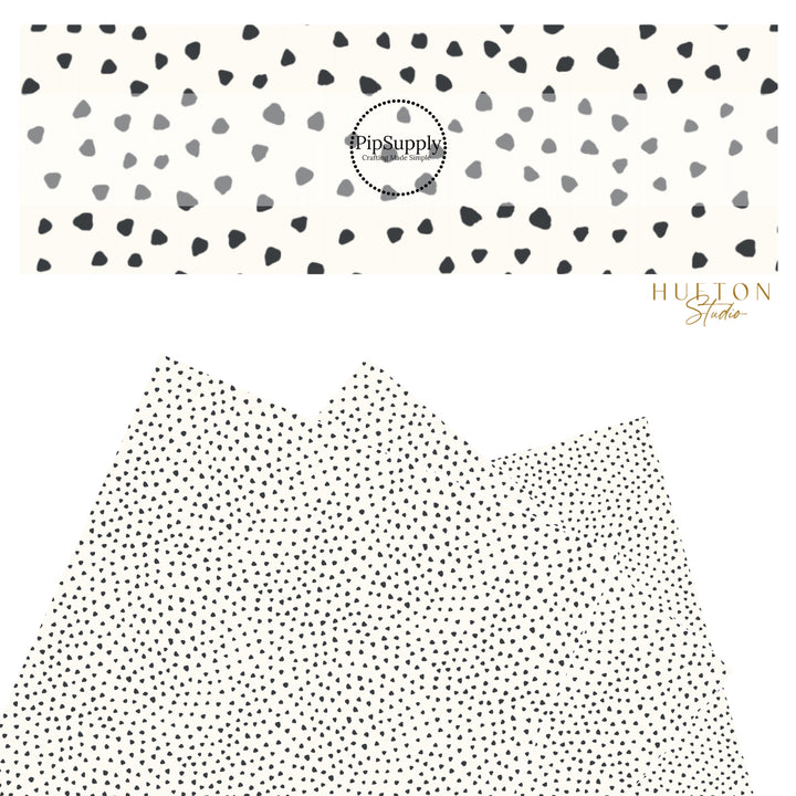 These speckled themed faux leather sheets contain the following design elements: small black speckled dots on ivory. Our CPSIA compliant faux leather sheets or rolls can be used for all types of crafting projects.