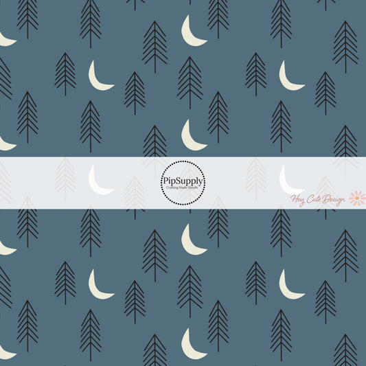 These forest dark navy fabric by the yard features pine trees and mountains on dark blue. This fun mountain themed fabric can be used for all your sewing and crafting needs! 