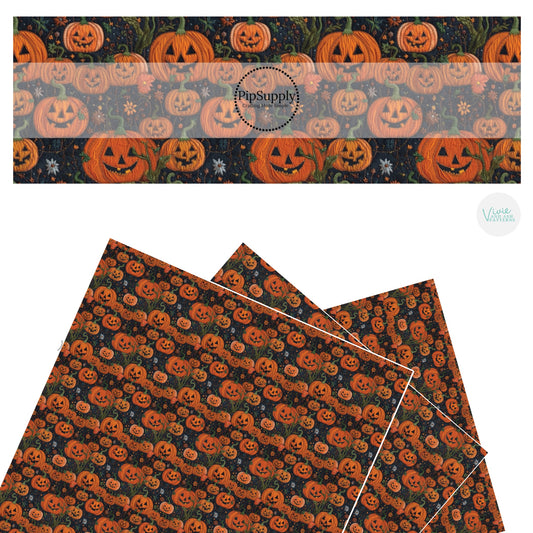 Orange pumpkins with flowers on black faux leather sheets