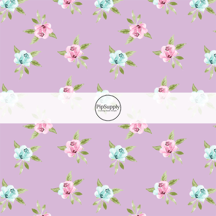 This summer fabric by the yard features pink and blue roses on purple. This fun summer themed fabric can be used for all your sewing and crafting needs!