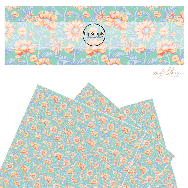 These pastel watercolor blooms on blue faux leather sheets contain the following design elements: light pink, peach, and light blue beautiful flowers and leaves.