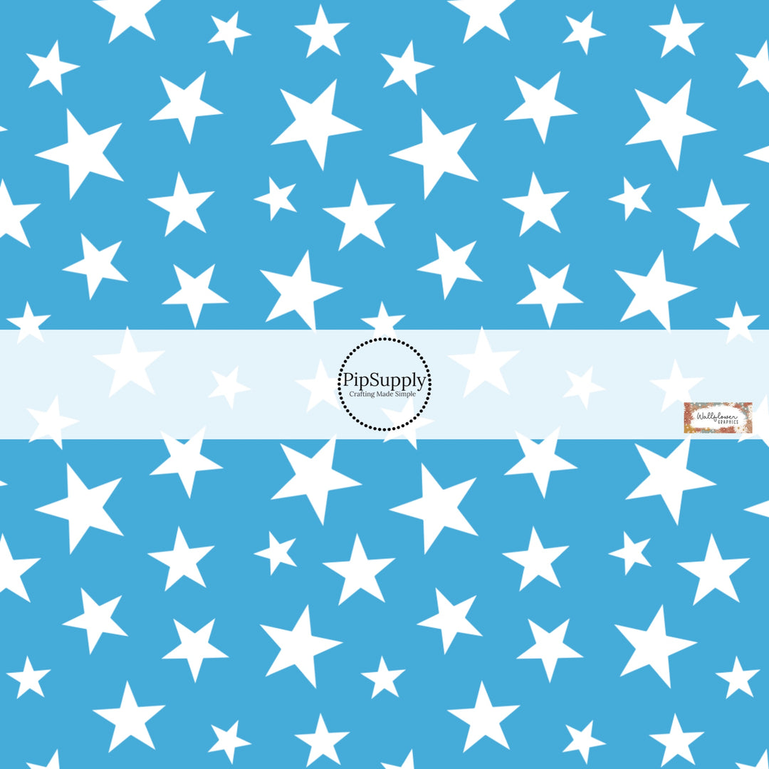 This 4th of July fabric by the yard features patriotic white stars on blue. This fun patriotic themed fabric can be used for all your sewing and crafting needs!