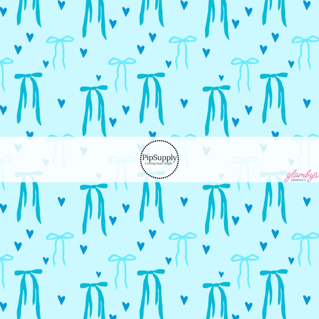 These Valentine's pattern no sew bow strips can be easily tied and attached to a clip for a finished hair bow. These Valentine's Day bow strips are great for personal use or to sell. The bow strips feature blue hearts and bows on light blue.