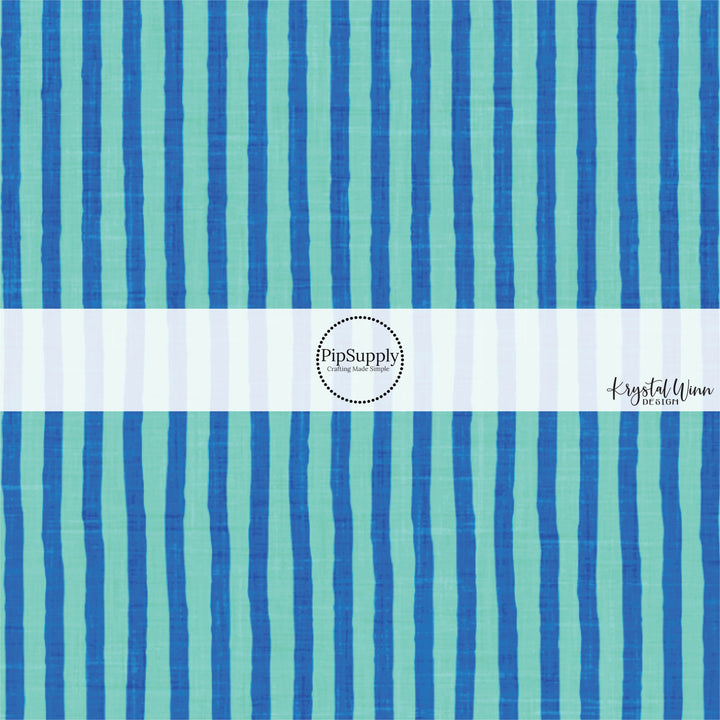 This summer fabric by the yard features bright blue stripes. This fun summer themed fabric can be used for all your sewing and crafting needs!