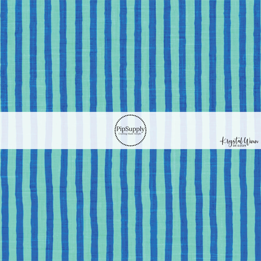 This summer fabric by the yard features bright blue stripes. This fun summer themed fabric can be used for all your sewing and crafting needs!