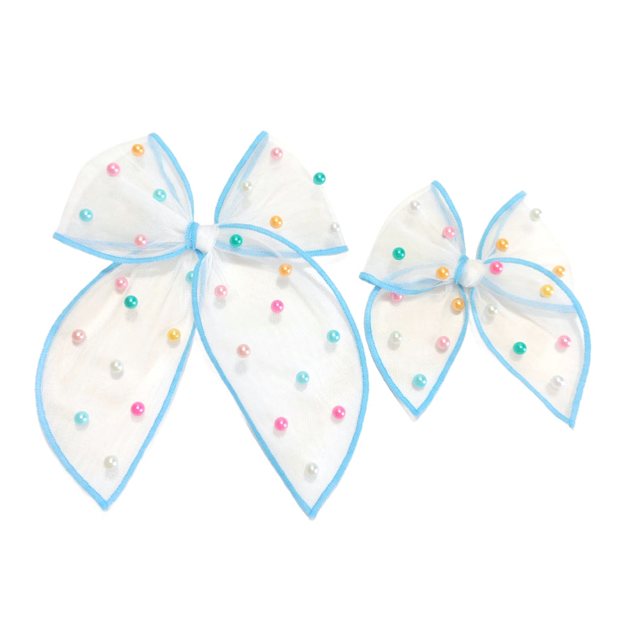 These spring tulle serged edge pre-cut tied bows with pearls are ready to package and resell to your customers no sewing or measuring necessary! These hair bows come with a clip already attached.