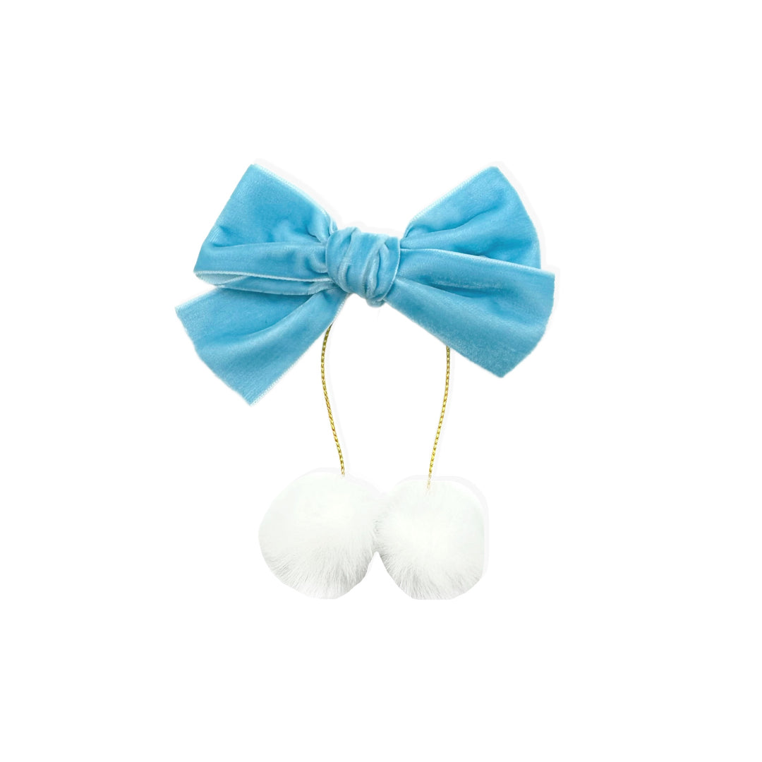 These Christmas velvet ribbon hair bow clips feature faux fur white pom poms. These bow clips can be used as piggie hair clips and are a stylish hair accessory and can be worn as they are. These hair clips are ready to wear or to sell to others.