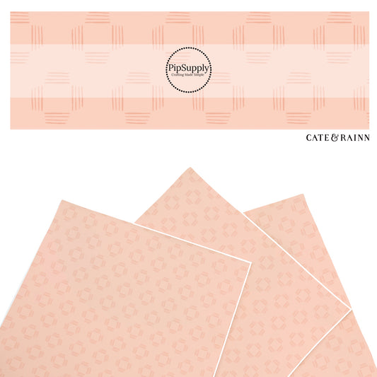These summer faux leather sheets contain the following design elements: squares on blush. Our CPSIA compliant faux leather sheets or rolls can be used for all types of crafting projects.