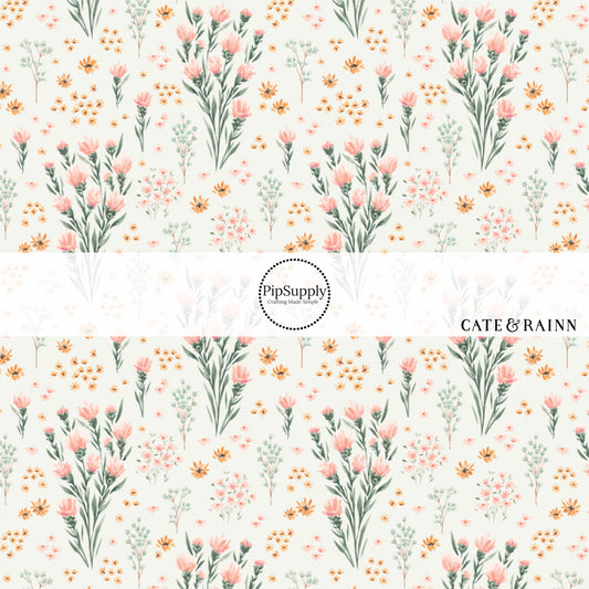 This summer fabric by the yard features blush wildflowers on cream. This fun summer themed fabric can be used for all your sewing and crafting needs!