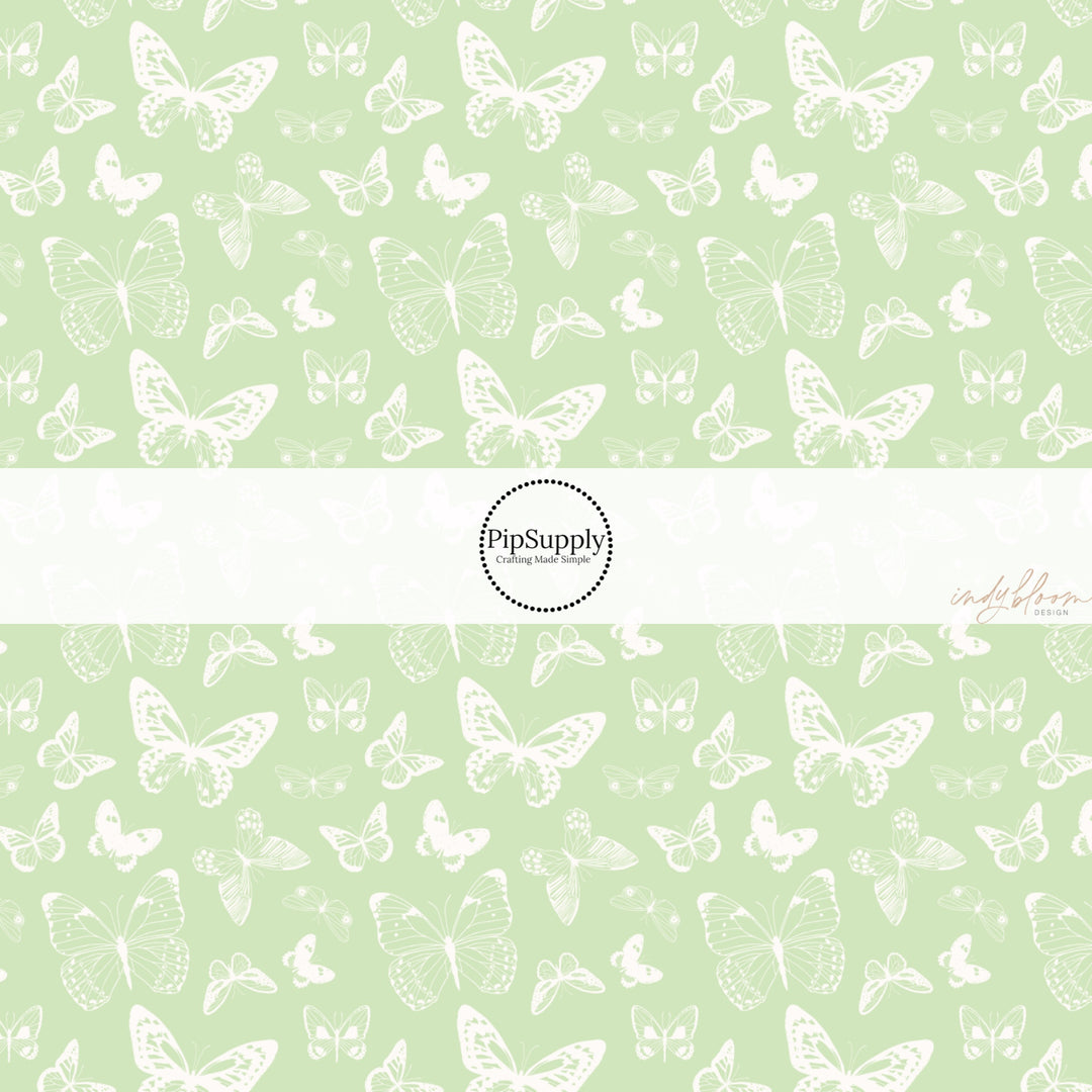 These spring fabric by the yard features boho butterflies on mint. This fun pattern fabric can be used for all your sewing and crafting needs!