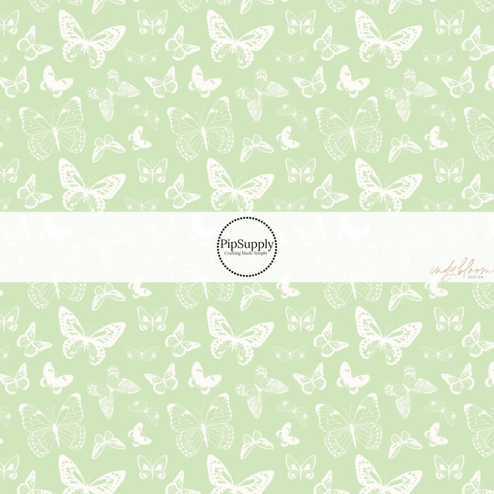 These spring fabric by the yard features boho butterflies on mint. This fun pattern fabric can be used for all your sewing and crafting needs!